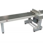 Cut to length rotary sheeter cuts rubber