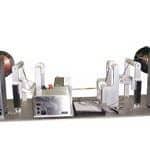 Lamination station with unwind, rewind and roll feed assembly