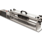 Modular shear cut slitter station slits epoxy and glass composite material to size