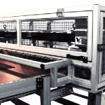 Shear cut traveling knife system with guarding and conveyor cuts foam material