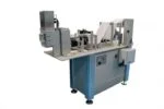 Cut to length system unwinds, pleats, heat seals, and cuts gauze