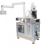 Cutting system to reduce pieces of synthetic rubber to small squares includes 2 guillotine knives and 2 conveyors