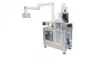 Cutting system to reduce pieces of synthetic rubber to small squares includes 2 guillotine knives and 2 conveyors