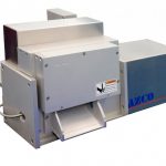 Cut to length unit cuts hand-fed PTFE sheets to length