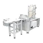 Complete system unwinds, feeds, punches, and cuts PVC film