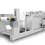 Cut to length station with unwind, precision punch assembly and shear cut slitter assembly cuts paper and film in roll form